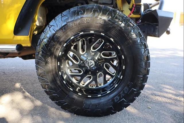Photo of 2011 Yellow Jeep Wrangler Unlimited