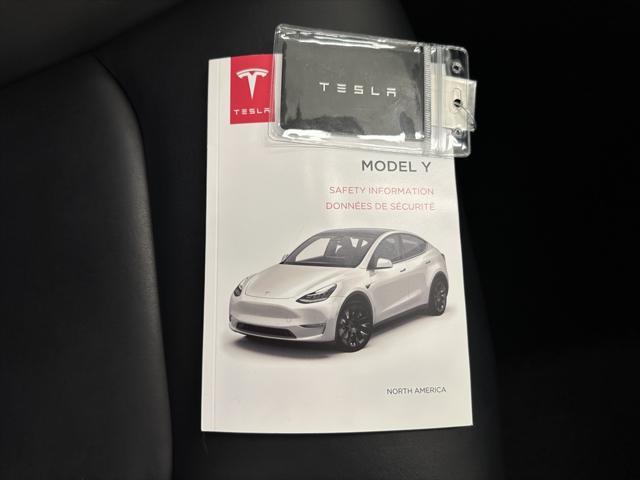 Photo of 2022 Pearl White Multi-Coat Tesla Model Y