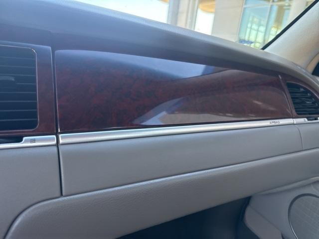 Photo of 2004 Tan Lincoln Town Car