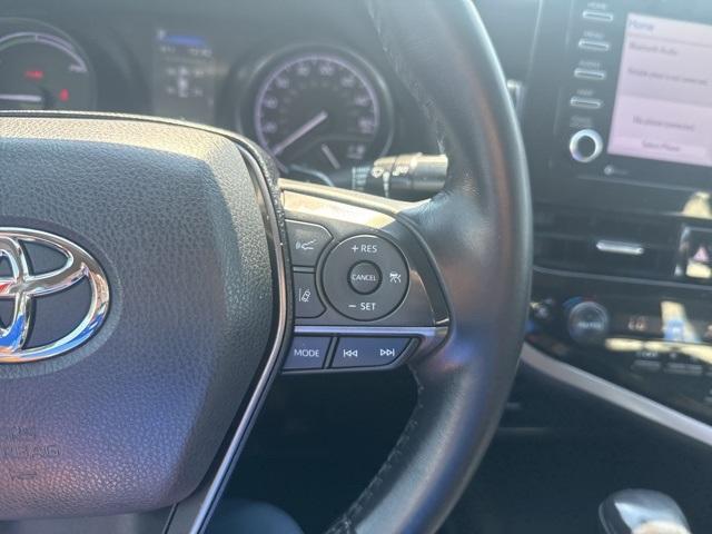Photo of 2021 Red Toyota Camry Hybrid