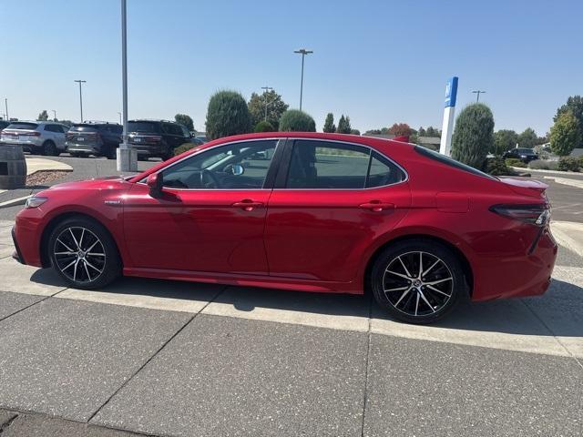 Photo of 2021 Red Toyota Camry Hybrid
