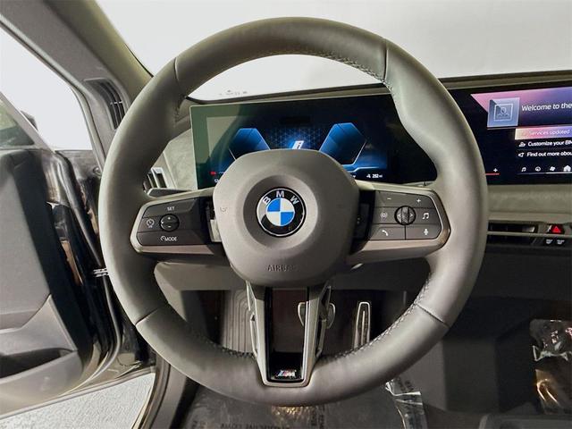 Photo of 2026 Black Sapphire Metallic BMW iX