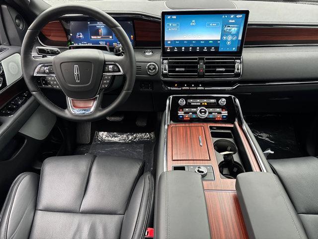 Photo of 2024 Diamond Red Metallic Tinted Clearcoat Lincoln Navigator