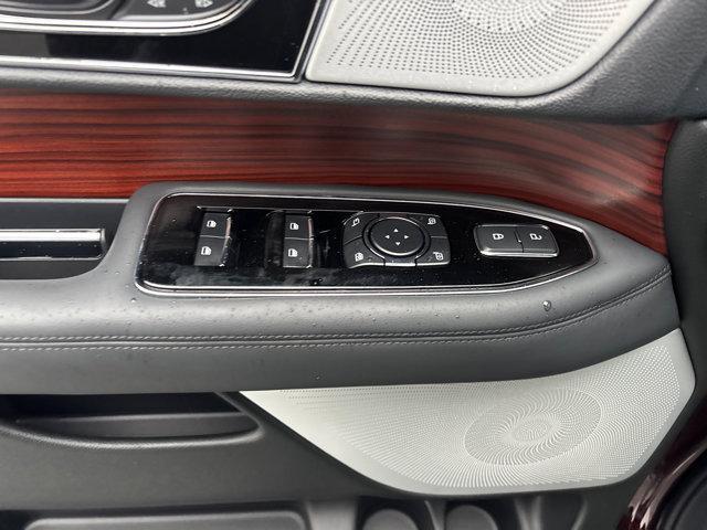 Photo of 2024 Diamond Red Metallic Tinted Clearcoat Lincoln Navigator