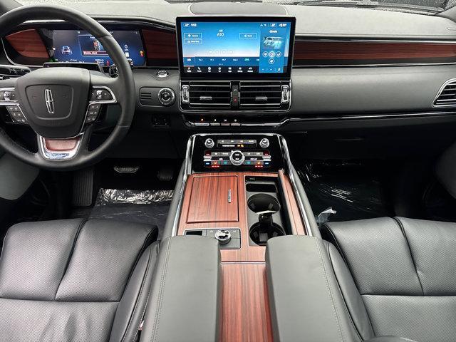Photo of 2024 Diamond Red Metallic Tinted Clearcoat Lincoln Navigator