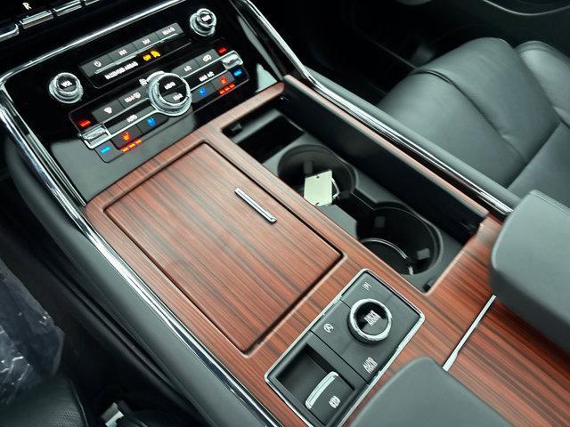Photo of 2024 Diamond Red Metallic Tinted Clearcoat Lincoln Navigator