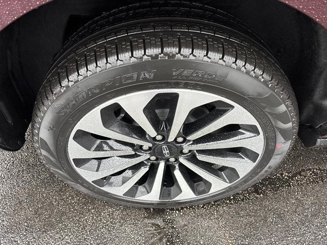 Photo of 2024 Diamond Red Metallic Tinted Clearcoat Lincoln Navigator