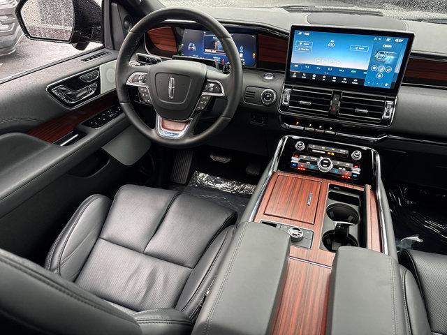 Photo of 2024 Diamond Red Metallic Tinted Clearcoat Lincoln Navigator
