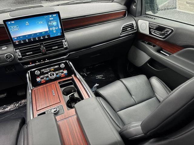 Photo of 2024 Diamond Red Metallic Tinted Clearcoat Lincoln Navigator