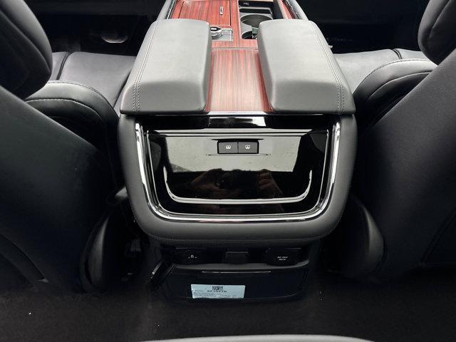 Photo of 2024 Diamond Red Metallic Tinted Clearcoat Lincoln Navigator
