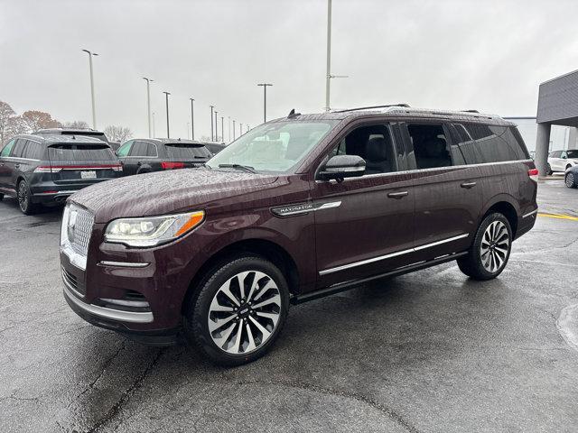 Photo of 2024 Diamond Red Metallic Tinted Clearcoat Lincoln Navigator