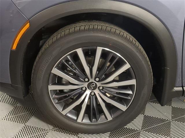 Photo of 2023 Moonbow Blue/Black Obsidian INFINITI QX60