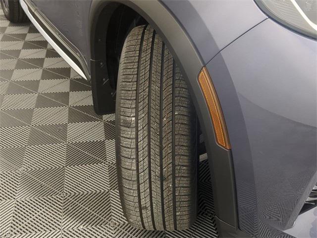 Photo of 2023 Moonbow Blue/Black Obsidian INFINITI QX60