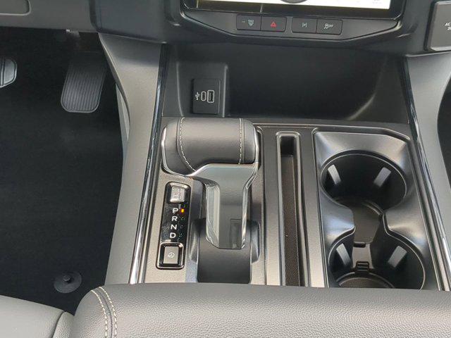 Photo of 2025 Agate Black Metallic Ford F-150 Lightning