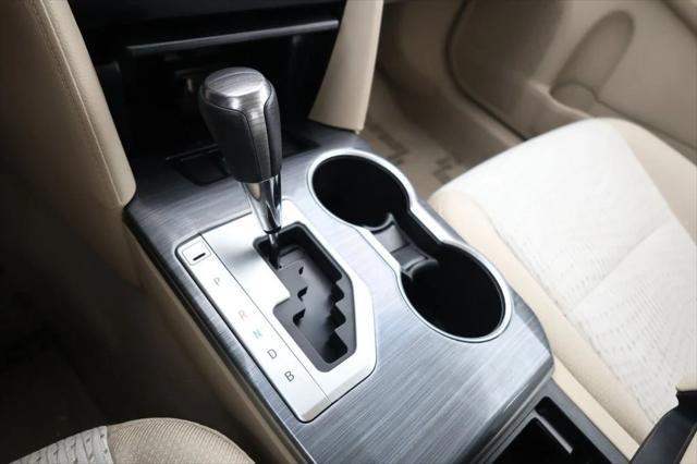 Photo of 2014 Super White Toyota Camry Hybrid