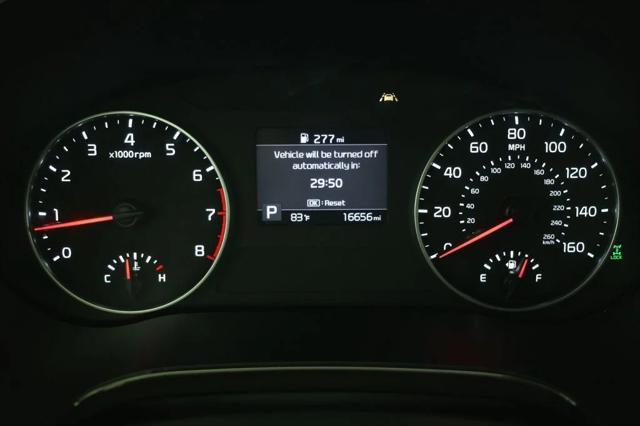 Photo of 2022 Cherry Black Kia Seltos