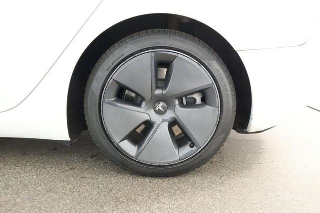Photo of 2021 Pearl White Multi-Coat Tesla Model 3