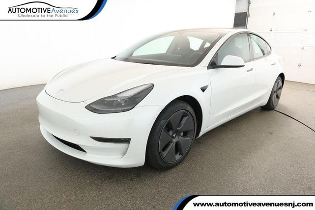 Photo of 2021 Pearl White Multi-Coat Tesla Model 3
