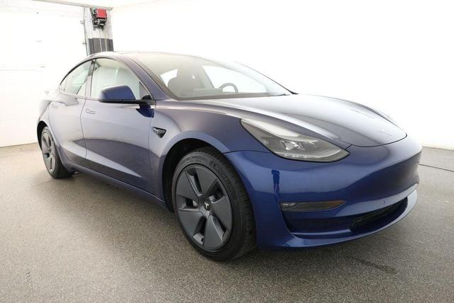 Photo of 2022 Deep Blue Metallic Tesla Model 3