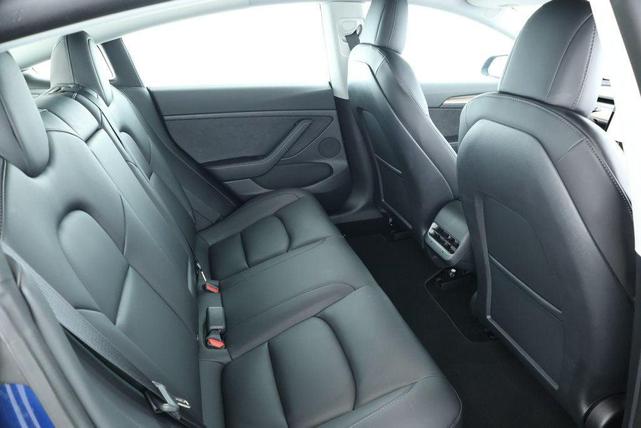 Photo of 2022 Deep Blue Metallic Tesla Model 3