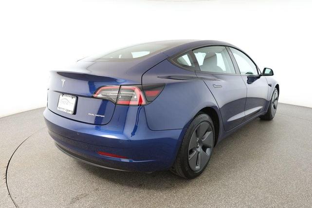 Photo of 2022 Deep Blue Metallic Tesla Model 3