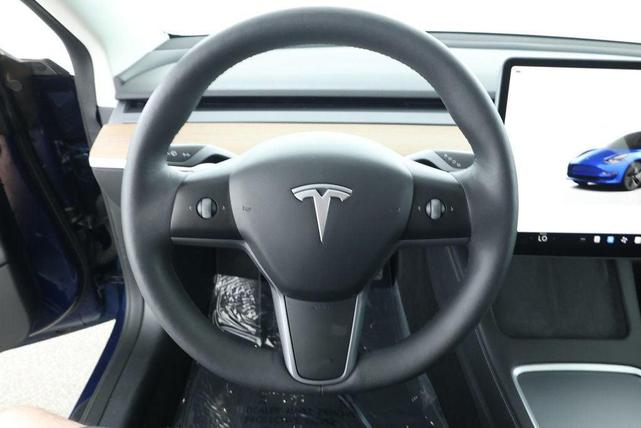 Photo of 2022 Deep Blue Metallic Tesla Model 3