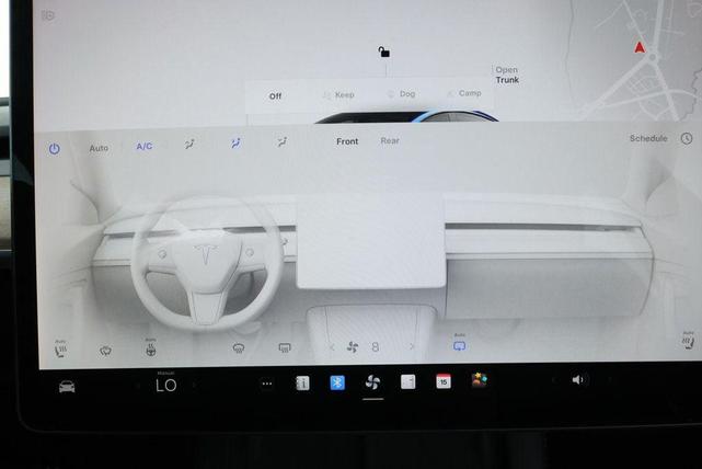 Photo of 2022 Deep Blue Metallic Tesla Model 3