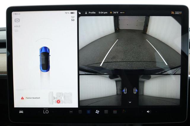 Photo of 2022 Deep Blue Metallic Tesla Model 3