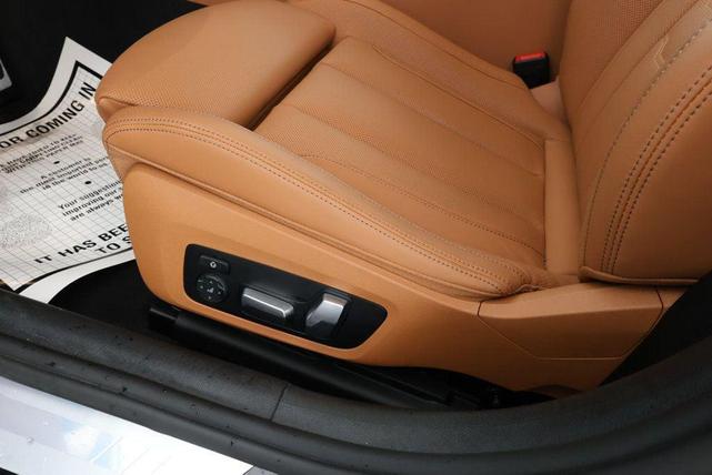 Photo of 2024 Carbon Black Metallic BMW 840