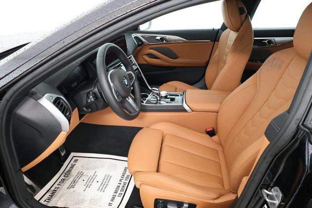 Photo of 2024 Carbon Black Metallic BMW 840