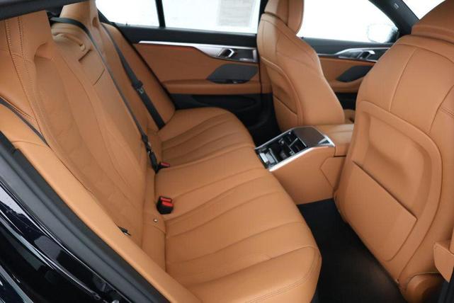 Photo of 2024 Carbon Black Metallic BMW 840
