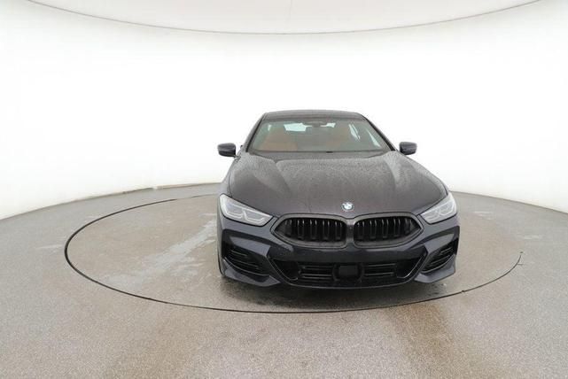 Photo of 2024 Carbon Black Metallic BMW 840