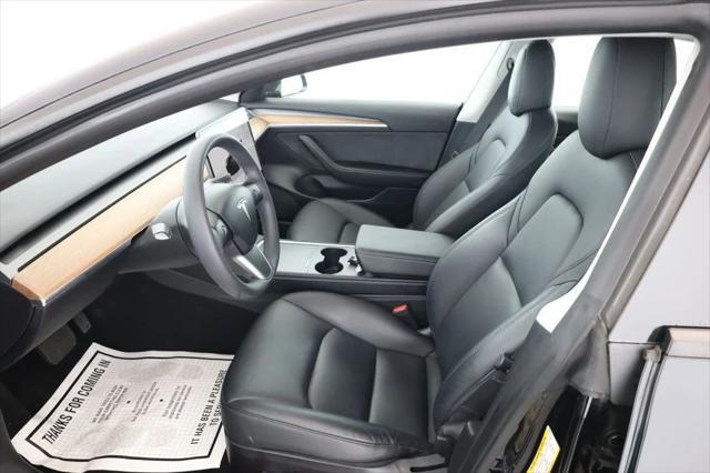 Photo of 2022 Solid Black Tesla Model 3