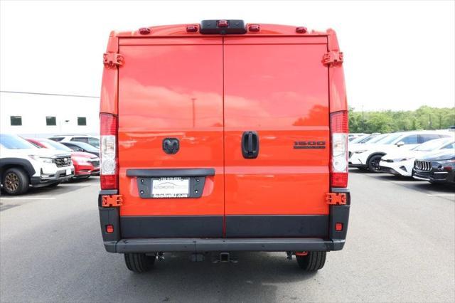 Photo of 2023 Spitfire Orange Clearcoat RAM ProMaster 1500