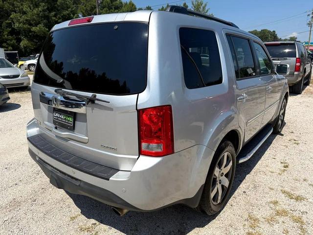 Photo of 2014 Alabaster Silver Metallic Honda Pilot