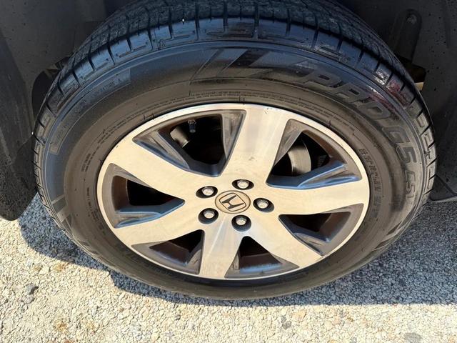 Photo of 2014 Alabaster Silver Metallic Honda Pilot