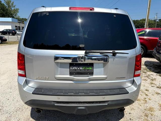 Photo of 2014 Alabaster Silver Metallic Honda Pilot