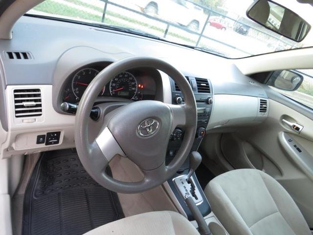 Photo of 2010 Gold Toyota Corolla