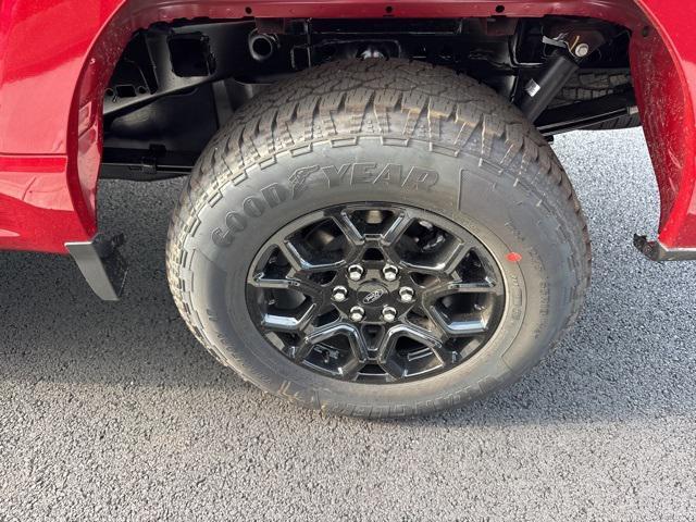 Photo of 2025 Rapid Red Metallic Tinted Clearcoat Ford F-150