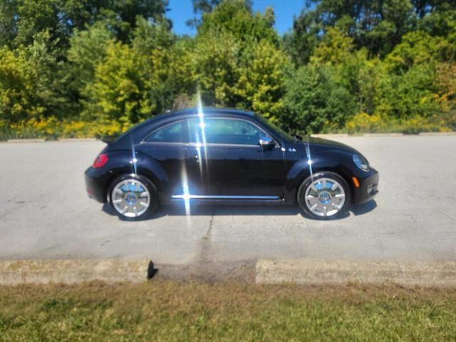 Photo of 2013 Deep Black Pearl Metallic Volkswagen Beetle