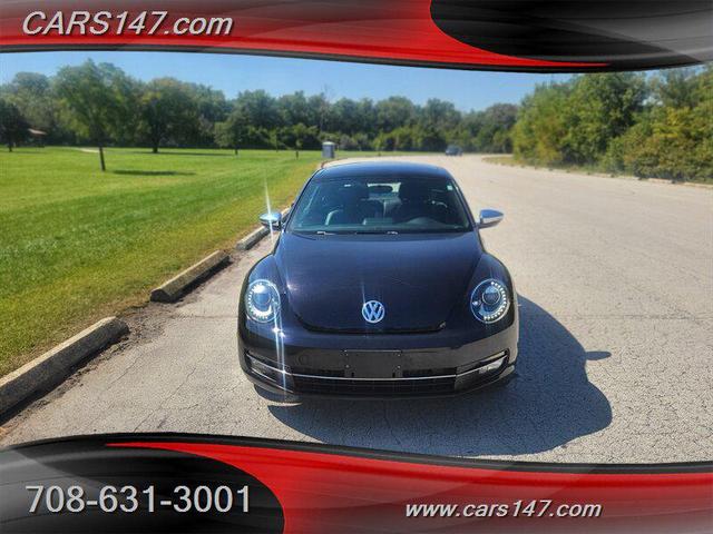 Photo of 2013 Deep Black Pearl Metallic Volkswagen Beetle