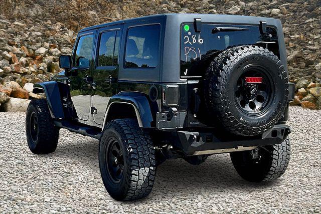 Photo of 2014 Black Clearcoat Jeep Wrangler Unlimited