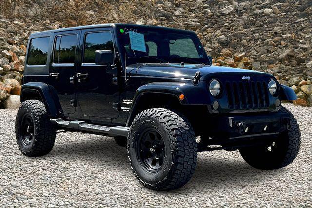 Photo of 2014 Black Clearcoat Jeep Wrangler Unlimited