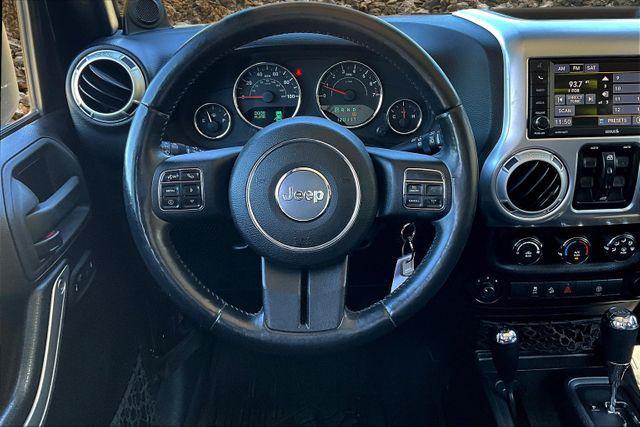 Photo of 2014 Black Clearcoat Jeep Wrangler Unlimited