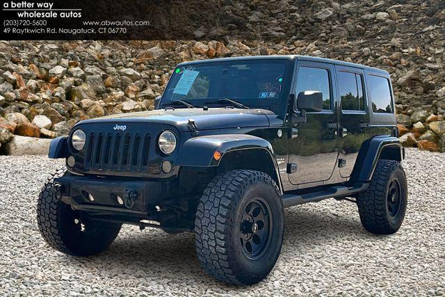 Photo of 2014 Black Clearcoat Jeep Wrangler Unlimited