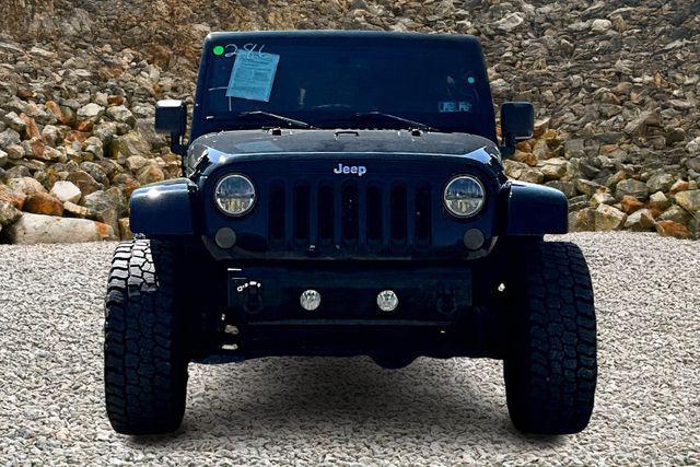 Photo of 2014 Black Clearcoat Jeep Wrangler Unlimited