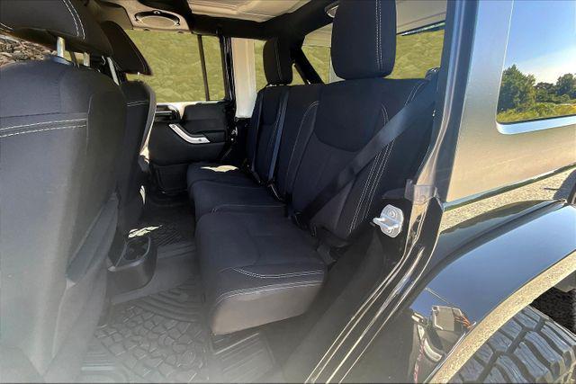 Photo of 2014 Black Clearcoat Jeep Wrangler Unlimited