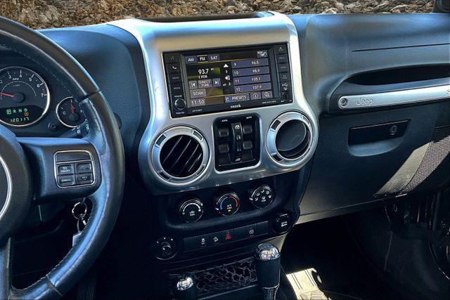 Photo of 2014 Black Clearcoat Jeep Wrangler Unlimited