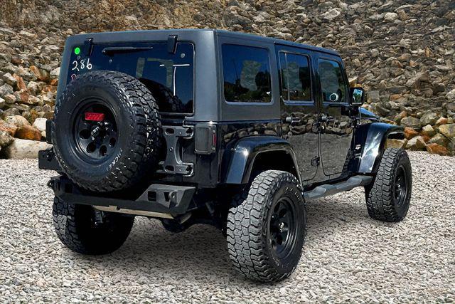 Photo of 2014 Black Clearcoat Jeep Wrangler Unlimited