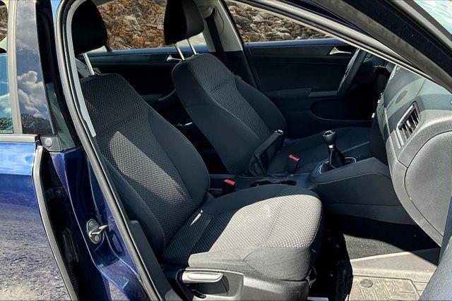 Photo of 2011 Tempest Blue Metallic Volkswagen Jetta
